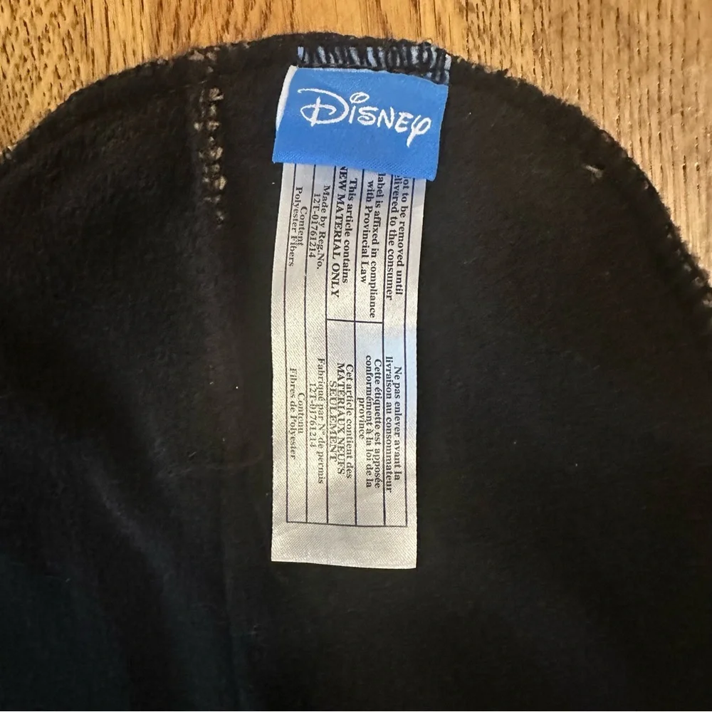 NWOT Disney Knit Hat 100% acrylic with black fleece lining 100% polyester